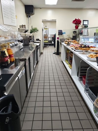 Indoor electrical sign reading Live Wide Open, Three Wide Brewing Co.