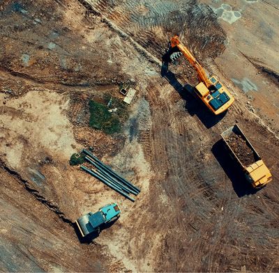 Benchmark One General Contracting conducting excavation for construction foundation setting