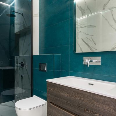 Bathroom with new vanity and turquoise tiling
