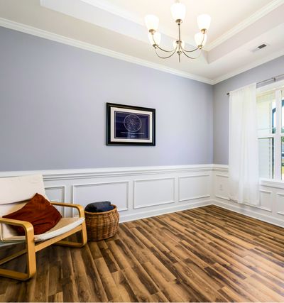 Newly renovated room with custom wooden paneling