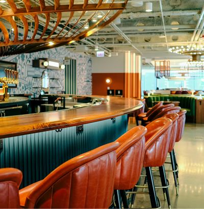 Restaurant with custom millwork bar in a glossy finish